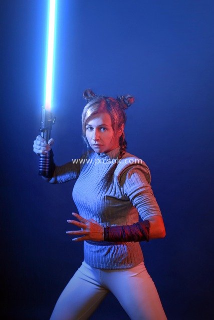 Female Star Wars Cosplay: Jedi Warrior with Blue Lightsaber