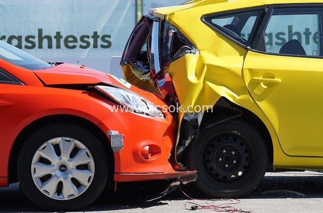 Crash Test Site: Real Shot of Rear-End Collision Between Red and Yellow Cars