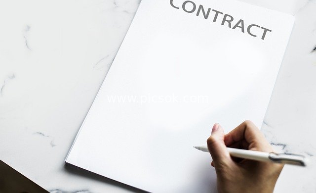 Business Contract Signing Scene: Pen-Signed Document Material