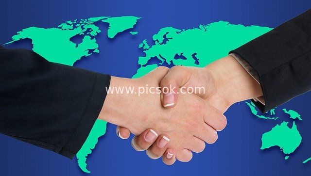 Business Handshake & Global Business Partnership Image