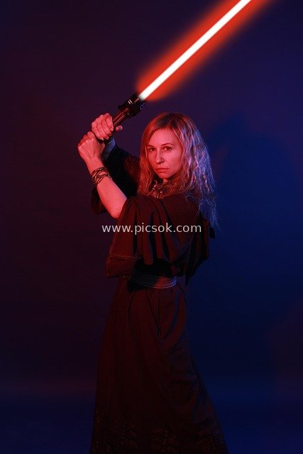 Star Wars Sith Cosplay Portrait of Female Character with Red Lightsaber