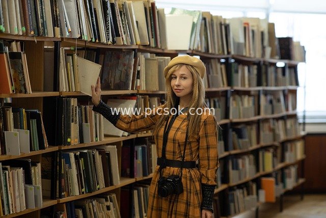 Vintage-Style Woman Reading in Library Photography Scene