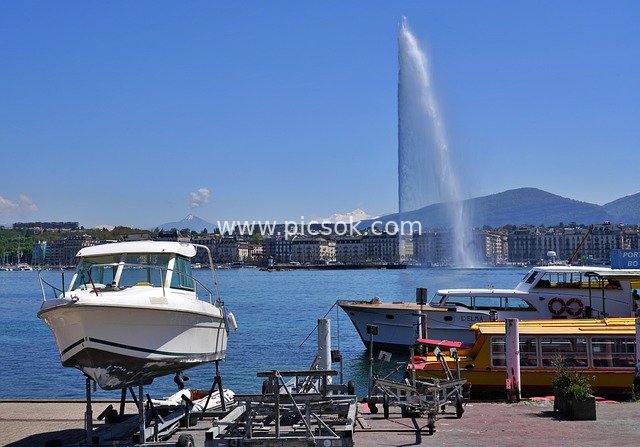 Scenic Beauty of Boats at Geneva Lake Port and the Jet d'Eau