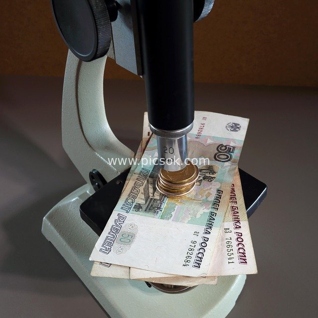 Analysis of Russian Ruble Banknotes and Coins Under a Microscope
