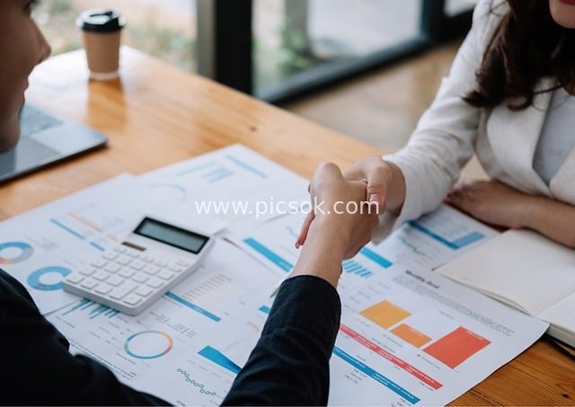 Business Cooperation Handshake & Team Collaboration in Office Scene