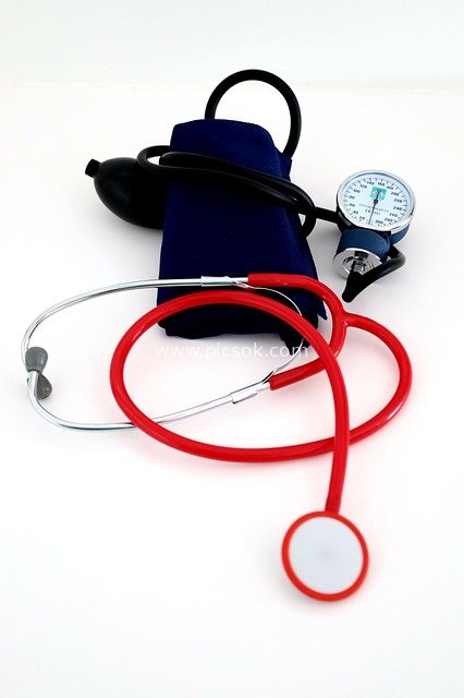 Combination of Red Stethoscope and Blue Sphygmomanometer Medical Equipment