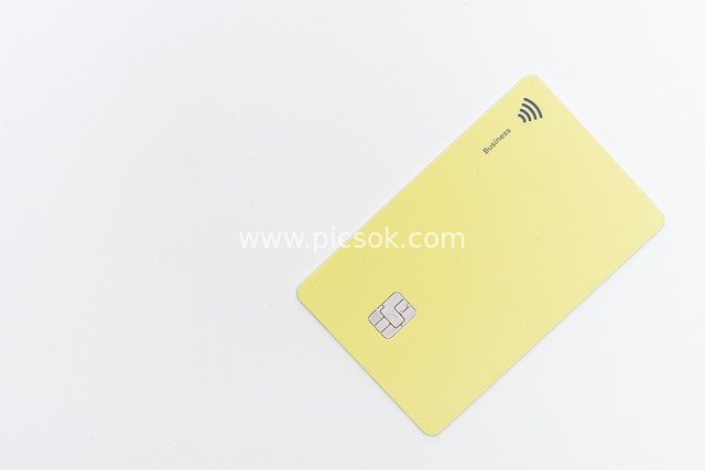 Close-up of a Yellow Contact Credit Card – Financial Payment Card Material
