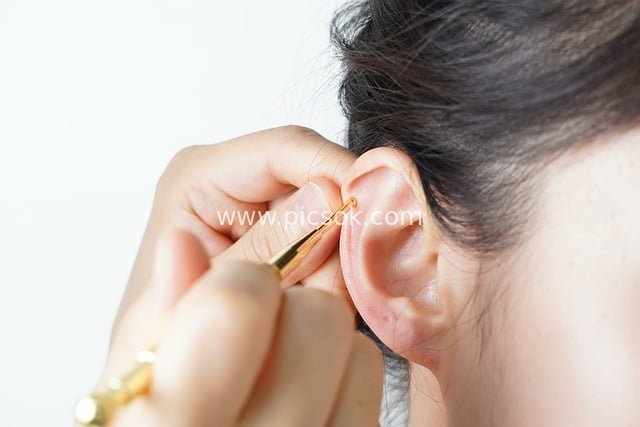 Korean Medicine Acupuncture Ear Needle Therapy - Traditional Medicine Health Care Scene