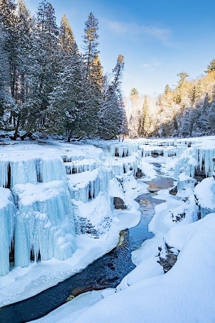 Canada's Winter Frozen Canyon: Ice Falls, Snowy Forests & Natural Beauty