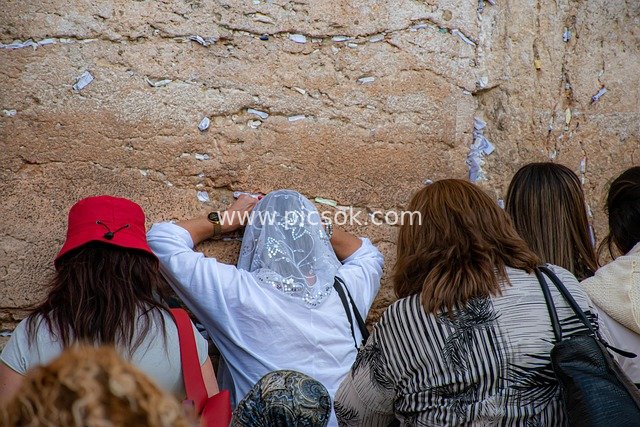 Devout Jewish Worshippers Praying at the Western Wall in Jerusalem