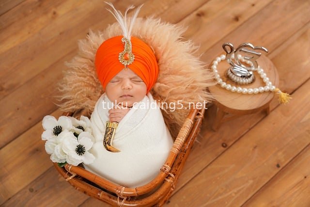 Newborn Photography: Cute Sleeping Baby with Wicker Basket Prop
