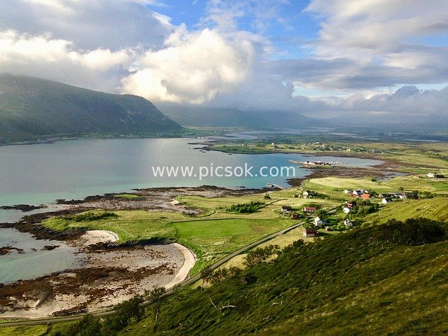 Nordic Coastal Scenery: Azure Seas, Lush Fields & Mountain Villages