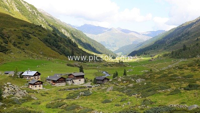 Natural Scenery of a Mountain Village in the Alps Valley