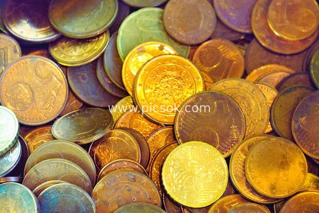 Close-Up of Euro Coins: Visual Representation of Gold Coins and Financial Wealth