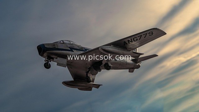 F-86 Sabre Fighter Model Soaring in the Dusk Sky