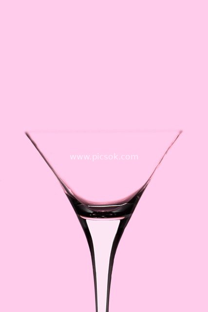 Martini Glass on Pink Background | Elegant Women's Leisure Time Visual Material