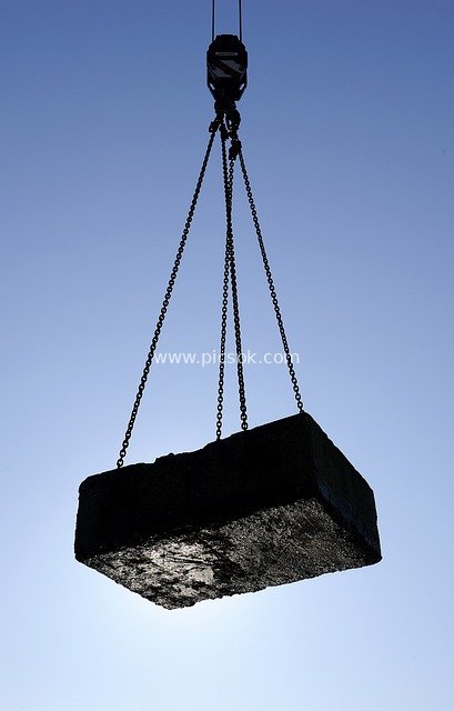 Crane Lifting Concrete Block – Industrial Construction Heavy Load Handling Scene