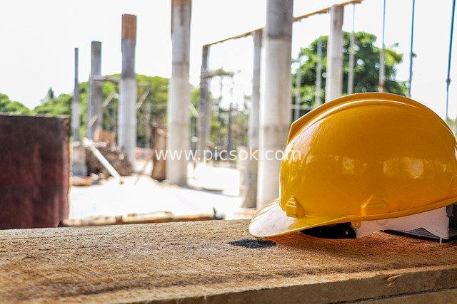 Yellow Hard Hat at Construction Site - Engineering Safety Protection Material