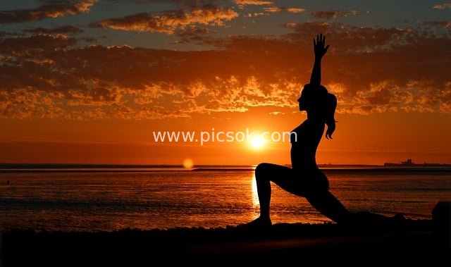 Yoga Silhouette at Seaside Sunset: Women’s Outdoor Healthy Lifestyle