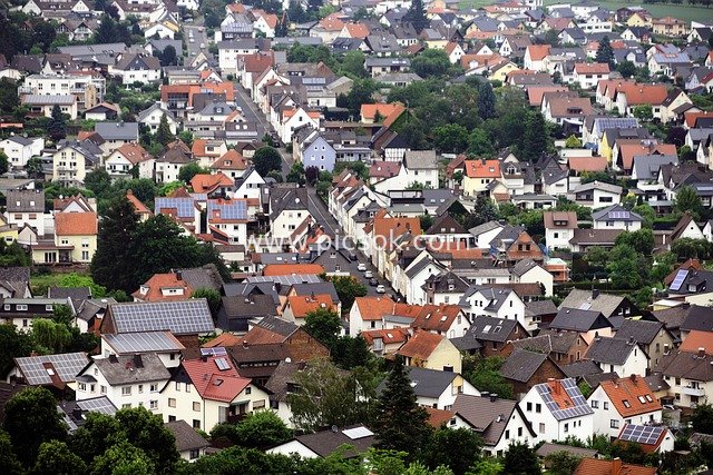 Aerial View of a Village in Hesse, Germany: Colorful Roofed Settlement Landscape