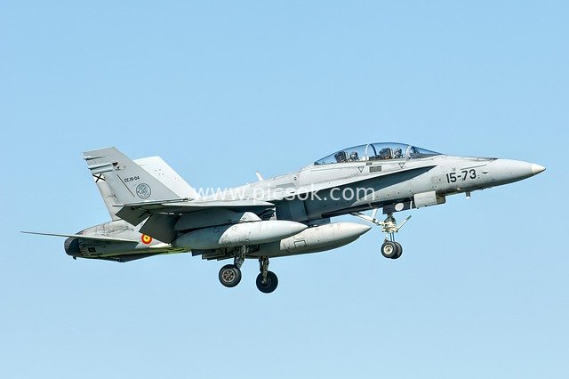 Spanish Air Force F-18 Hornet Fighter Jet Flying in the Blue Sky