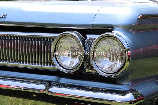 High-Definition Close-Up of Steel Blue Headlights on a Vintage Classic Car