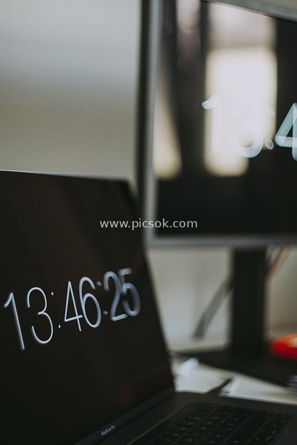 Digital Clock Tech Office Scene with Laptop and Monitor