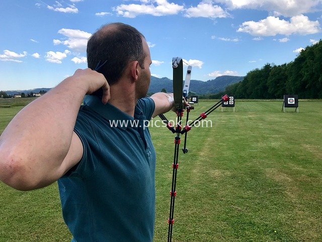 Outdoor Archery: A Thrilling Moment of Focused Aiming at the Target