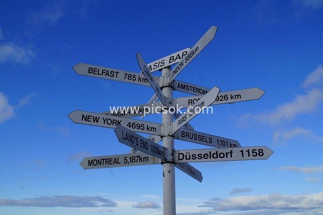 Multi-City Distance Road Sign | Travel Direction Sign with Blue Sky Background