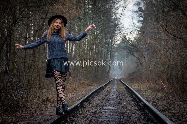 Gothic Blonde Woman Outfit on Autumn Forest Railway Tracks