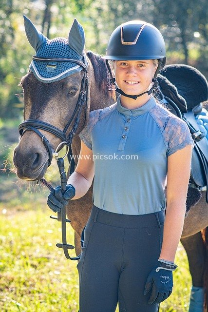 Outdoor Equestrian Moment with a Teenage Rider and Her Horse