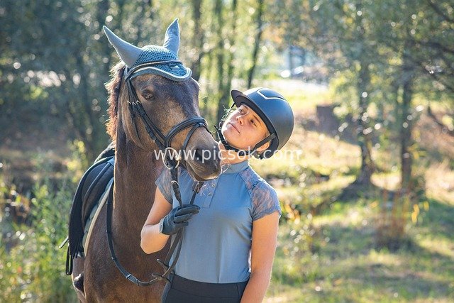 Heartwarming Equestrian Moment: A Girl and a Brown Mare in the Forest