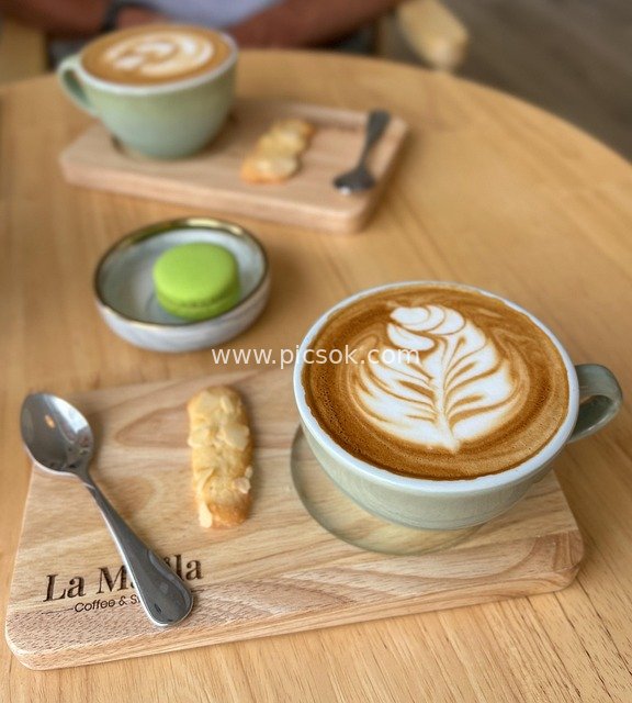 Cozy Afternoon Tea with Exquisite Coffee Latte Art and Macarons