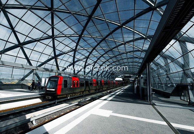 Modern Glass Dome Subway Station and Red Train in Hamburg Hafencity