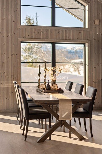 Modern Luxurious Restaurant by Floor-to-Ceiling Windows with Snowy Views