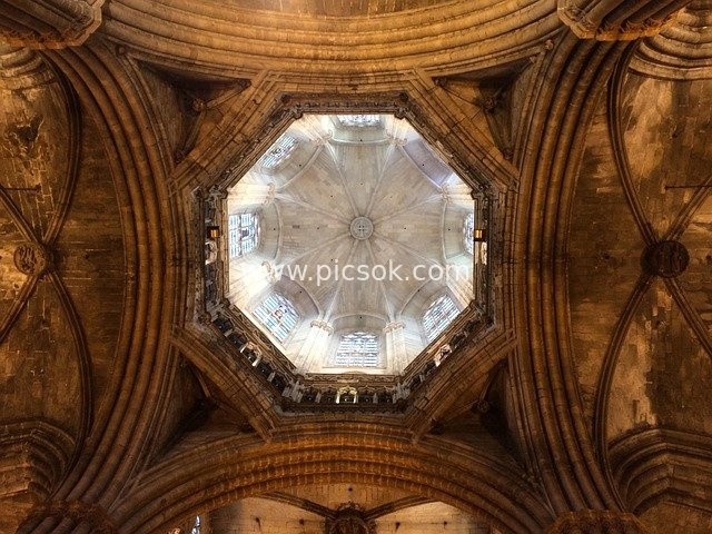 Appreciation of Architectural Details Inside the Dome of a Barcelona Church