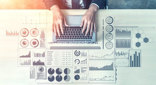 Top View of Business Data Analysis in Tech Office Scene