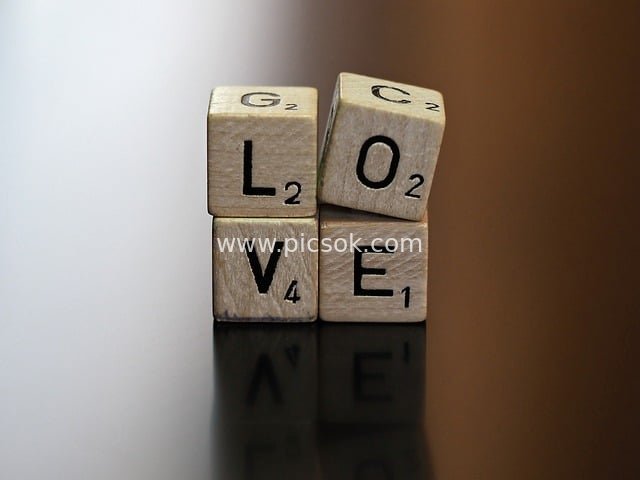 Wooden Dice Spelling LOVE: Romantic Valentine's Day Creative Letter Image