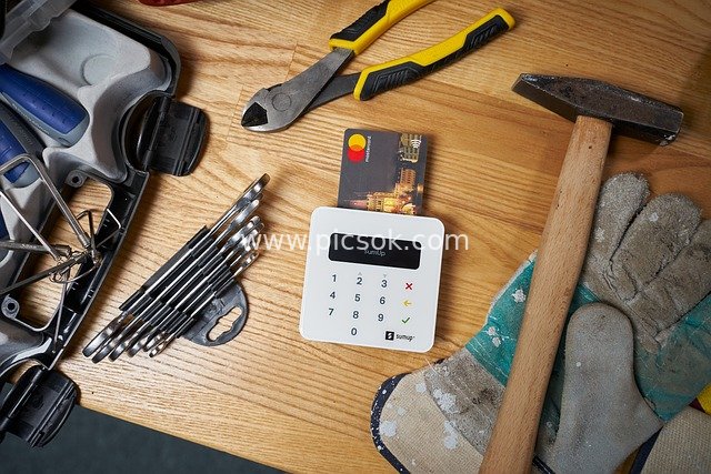 Payment Scene Featuring SumUp Payment Terminal Next to Repair Tools
