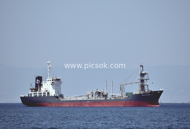 Ocean-going Cargo Ship Sailing at Sea - Maritime Trade Transportation Scene