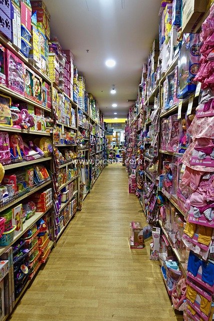 Toy Store Shopping Aisle: Colorful Shelves Filled with Playful Toys