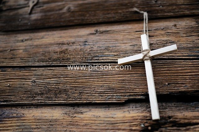 Wooden Cross – Christian Faith Symbol on Retro Wooden Background