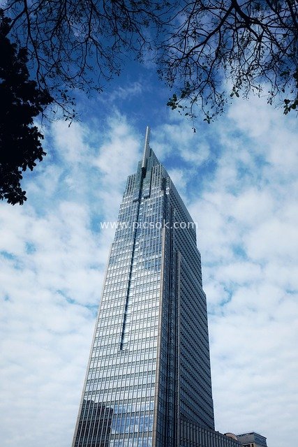 Saigon Trade Center: Modern Skyscraper Against Clear Blue Sky