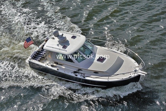 Aerial View of Luxury Yacht Cruising at Sea – Vacation Yacht Sailing Scene