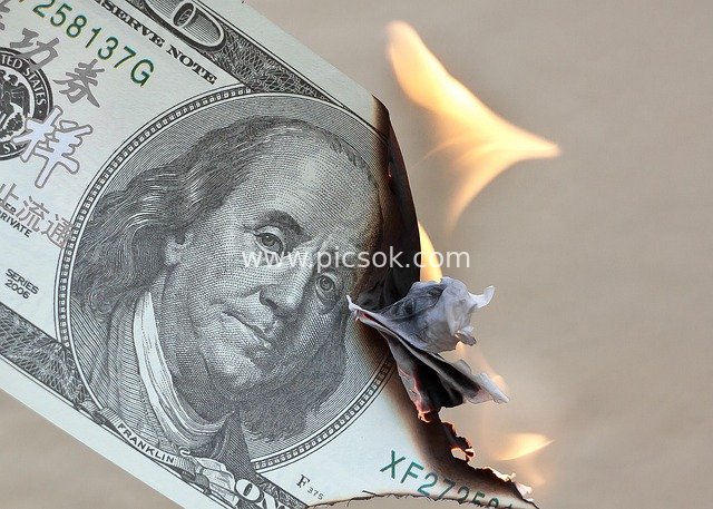Burning Hundred-Dollar Bill: A Symbol of Financial Risk and Vanishing Wealth