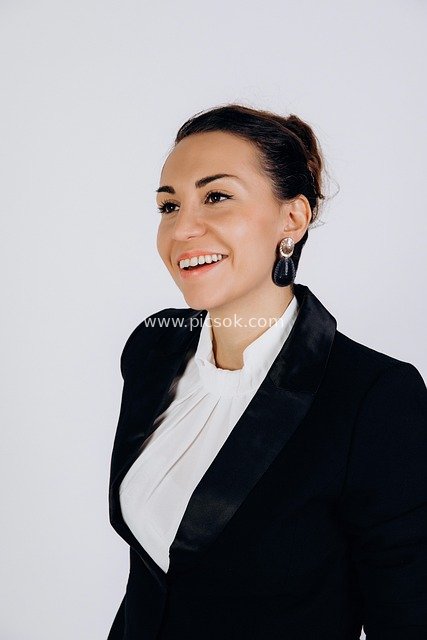 Professional Portrait of a Smiling Businesswoman in Business Attire
