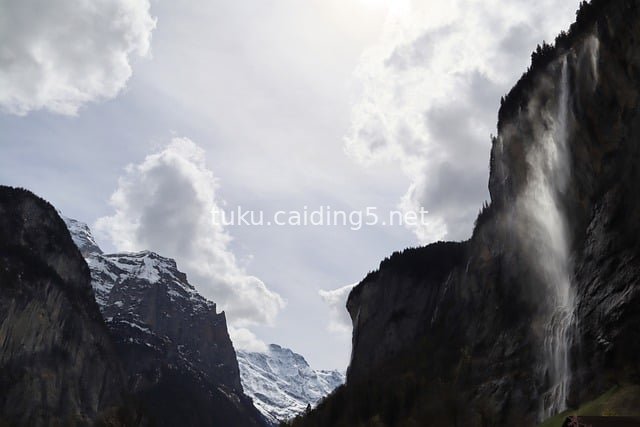 Magnificent Natural Landscape of Waterfalls and Snow-capped Mountains in Lauterbrunnen, Swiss Alps