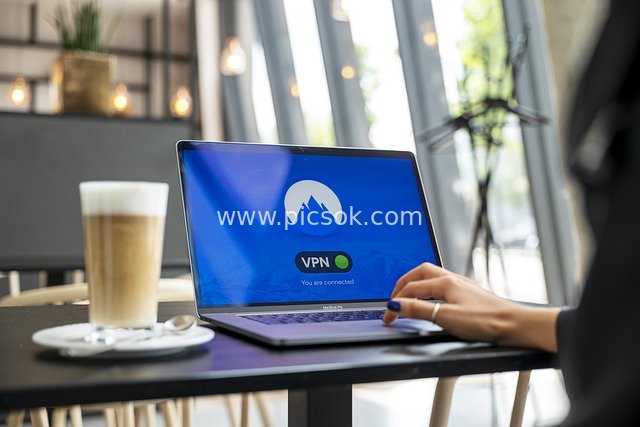 VPN-Connected Laptop and Latte in a Café