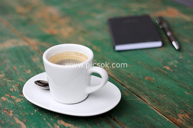 Business Casual: A Cozy Scene with Espresso Cup and Notebook
