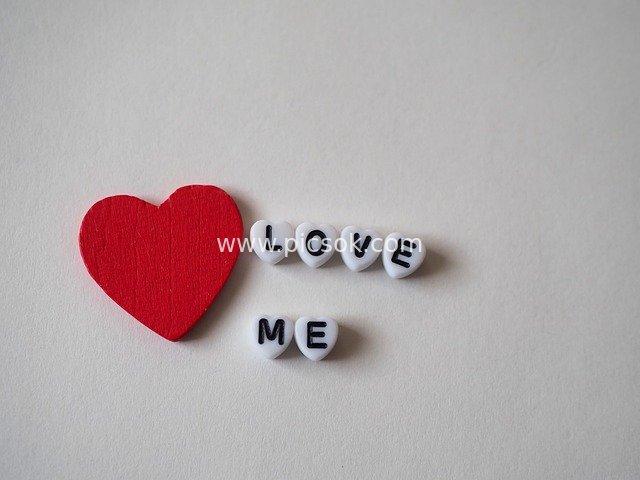 Romantic Confession Graphic Featuring Red Heart and 'LOVE ME' Letters